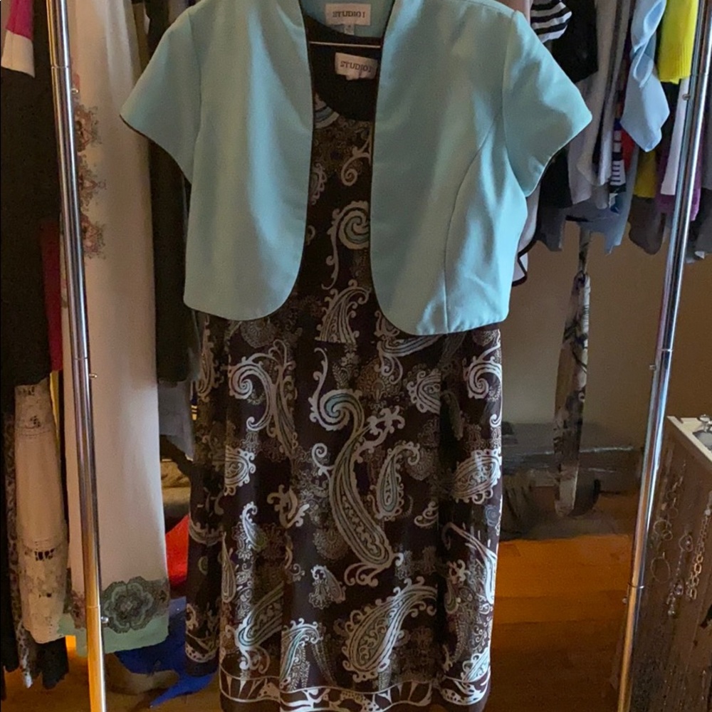 Dress with shoulder cover